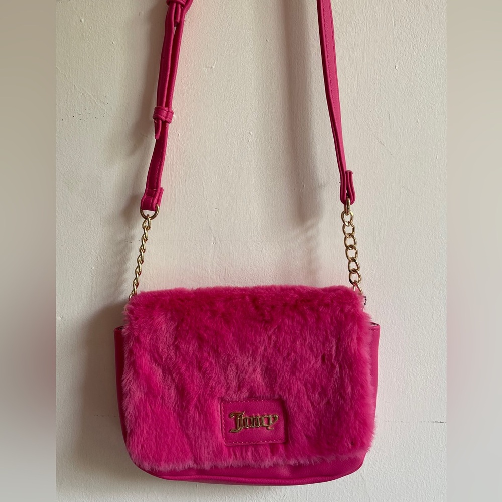 Juicy couture hot pink handbag.